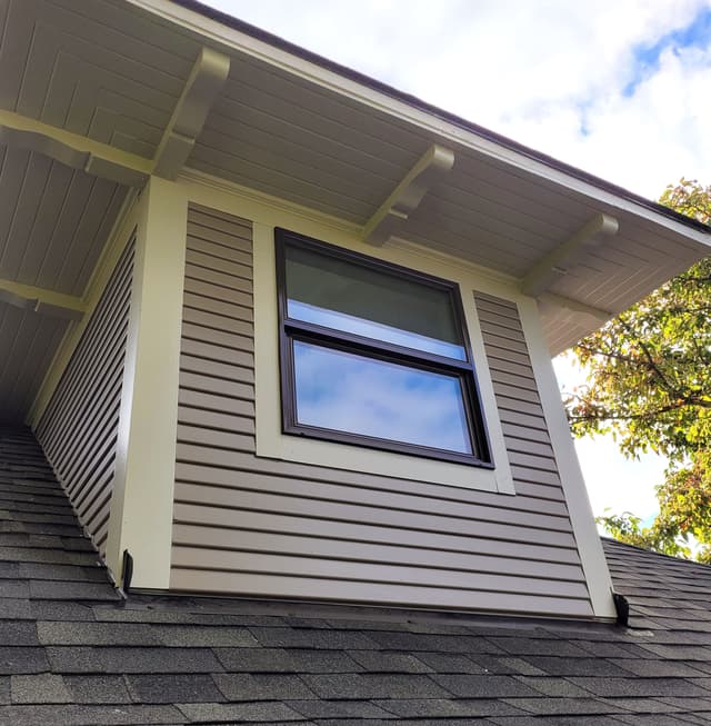 A dormer window on a Portland Foursquare home.